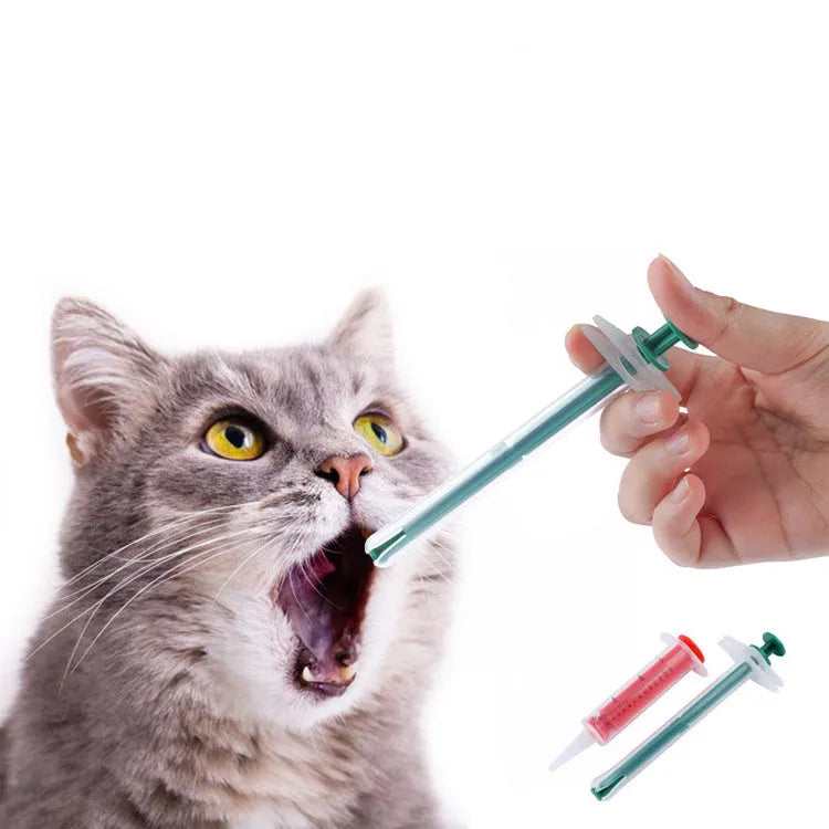 Two pet pill shooter guns with soft silicone tips in different sizes for cats and dogs