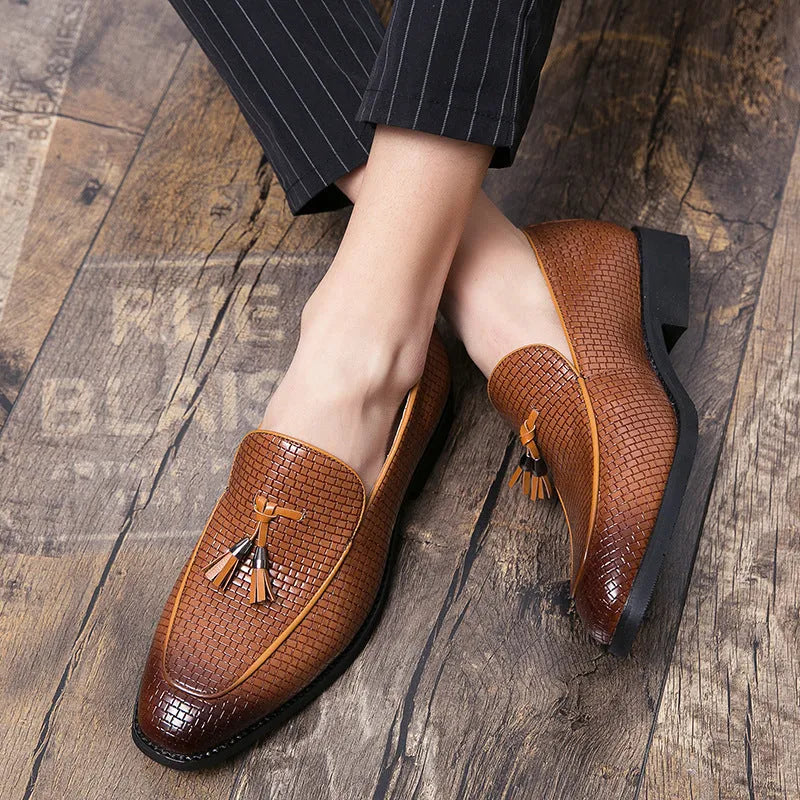 Men's black pointed slip-on shoes with tassel detail on artificial PU upper