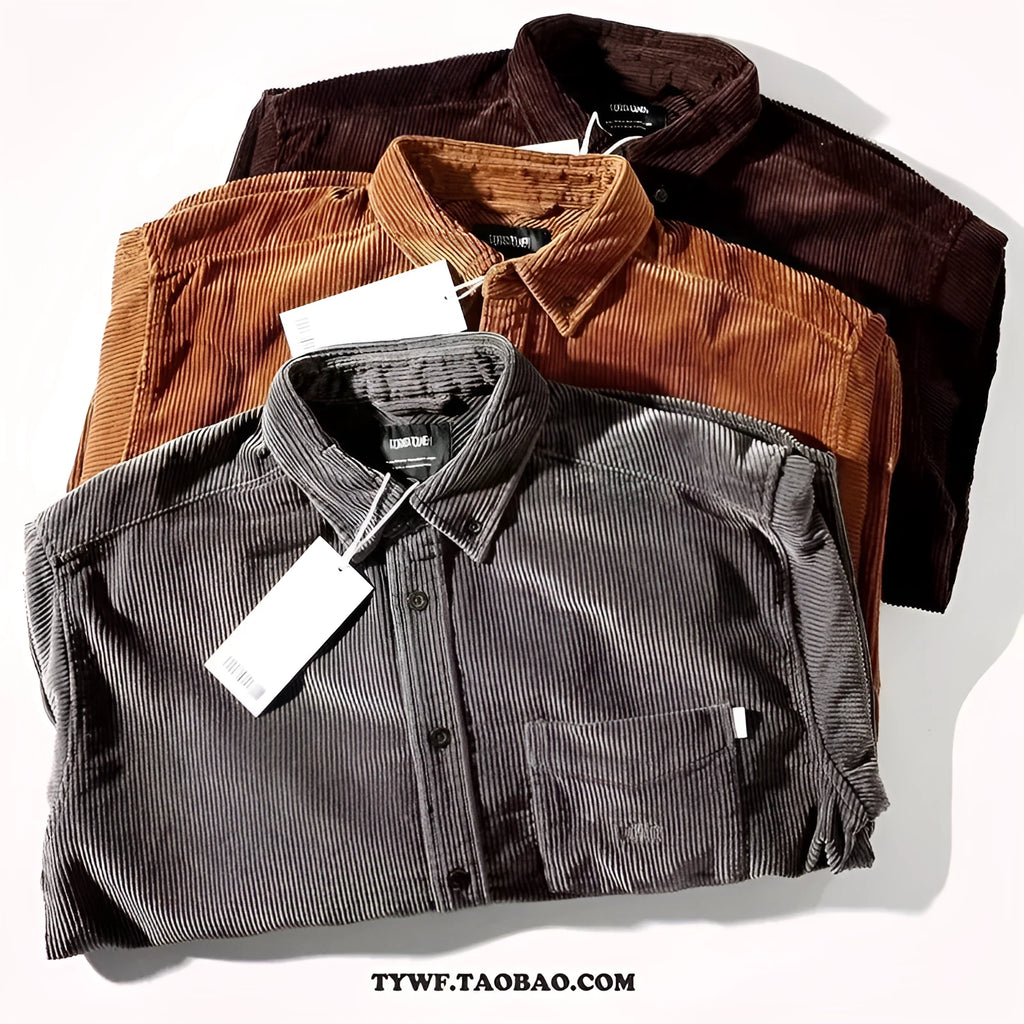 Loose long sleeve corduroy shirt in caramel colour, cardigan style, laid flat.