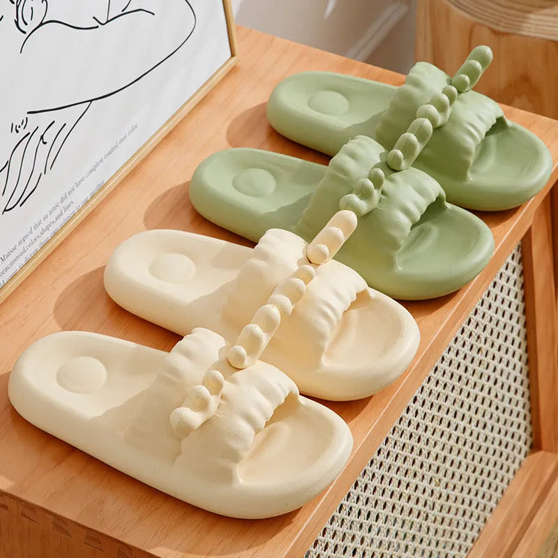Cute deer horn design EVA flip flop slippers for women and men in light yellow, shown on a non-slip sole.