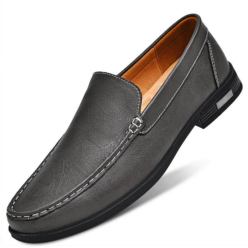 Breathable brown leather casual shoes for men with round toe, car-stitching detail, and leather covers
