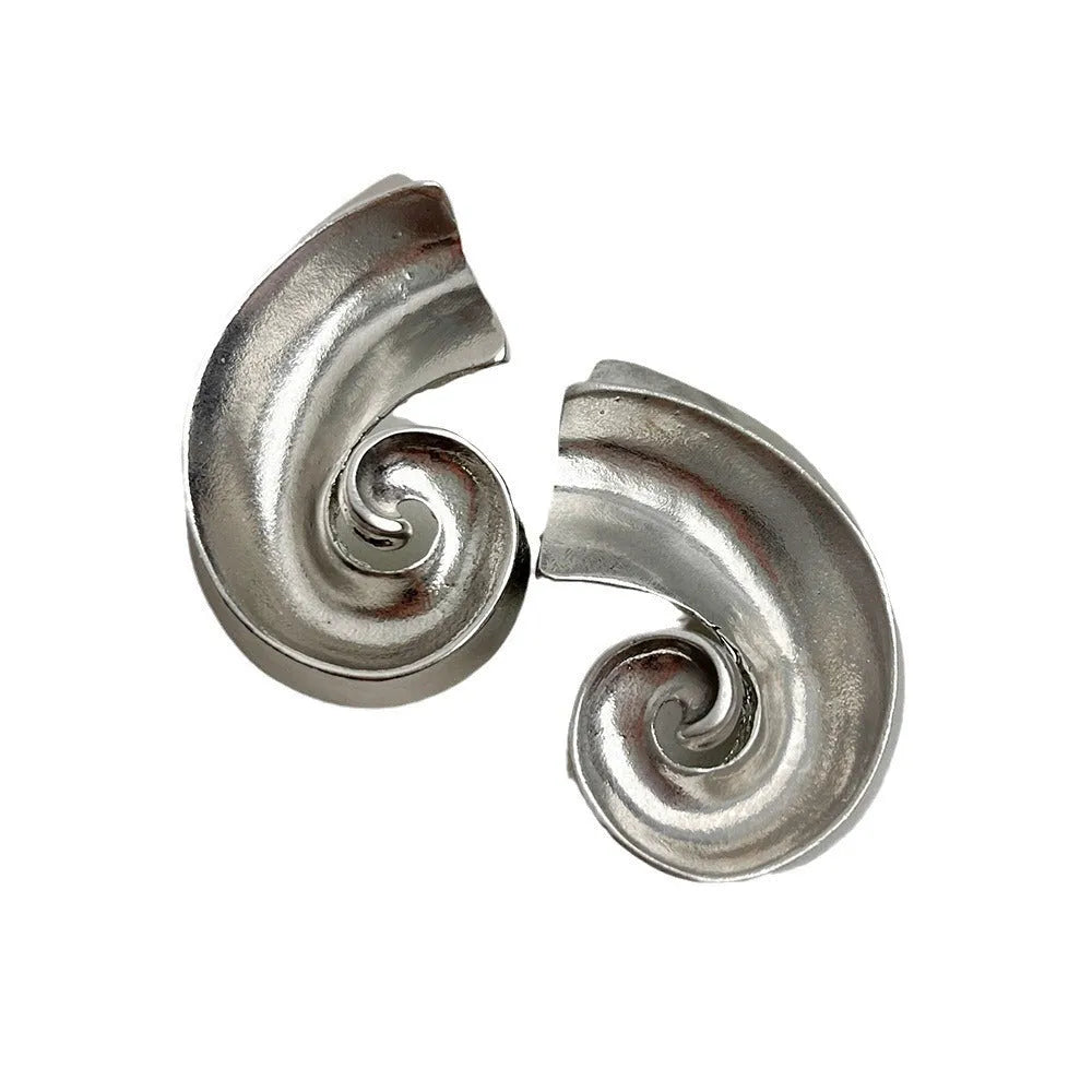 A pair of geometric-shaped alloy ear studs with a retro design, shown in gold and silver colours on a post backing.