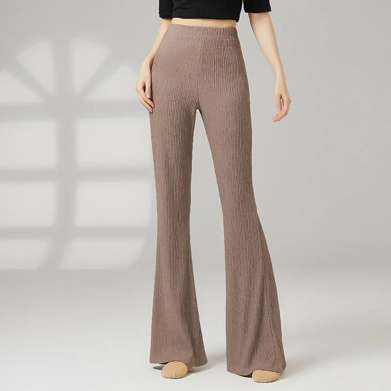 Close-up of solid colour polyester dance practice trousers for women, showing the form-fitting fit.