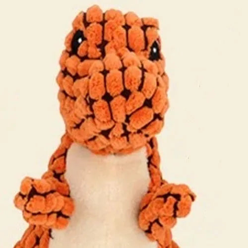 Grey, green, or orange bite-resistant rubber dog toy with sound feature for chewing.