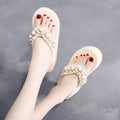 Women's beige high-heeled flip-flops with a casual cotton cloth upper.