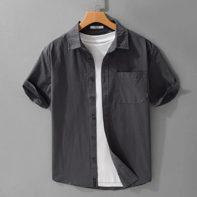 Mens white cotton short sleeve cardigan shirt with loose fit on model