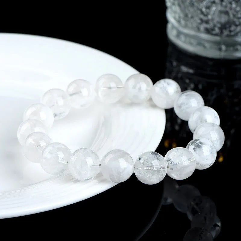 Crystal bracelet with blizzard snowflake pattern beads featuring Ruyi and Xiangyun symbols in geometric shape
