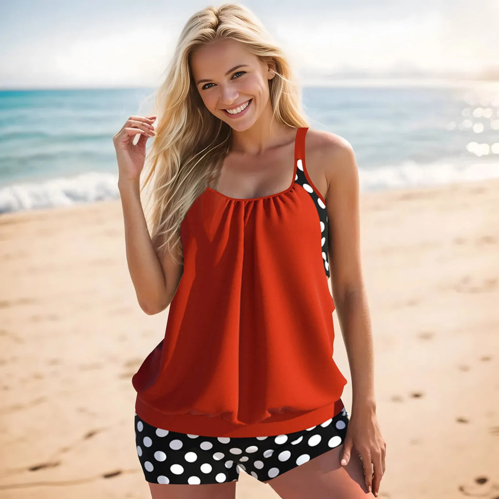 Women's black polka dot high-waisted boxer swimsuit laid flat, showing brief style and print detail.