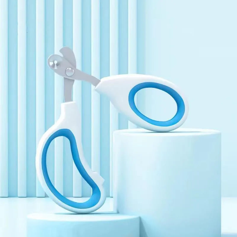 Blue professional pet nail clippers with circular safety hole and non-slip handle.