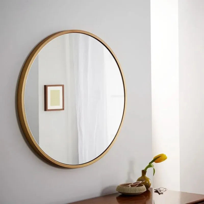 Round iron bathroom wall mirror in black finish, 30cm or 60cm diameter, hanging on a tiled wall for dressing and makeup use