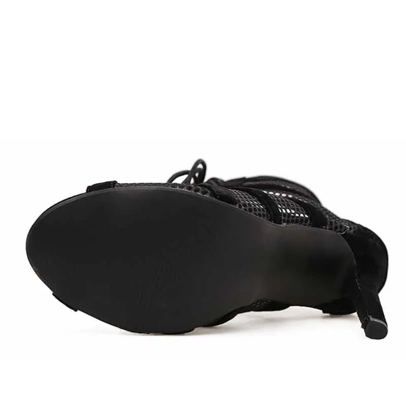 Black suede women's high heel shoes with lace-up ankle closure and an 11.5 cm heel.