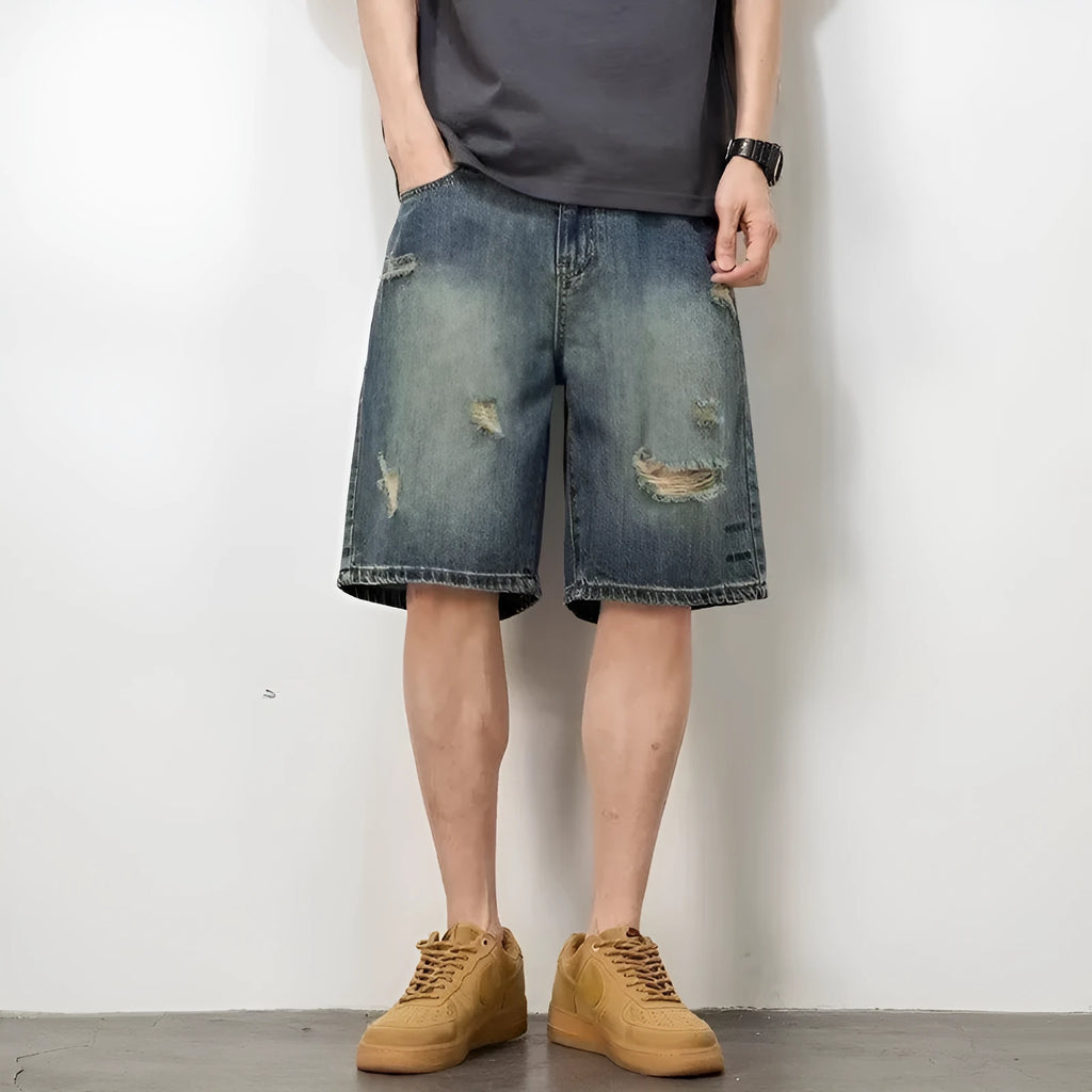 Men's blue denim shorts with loose hole retro styling and straight cut design