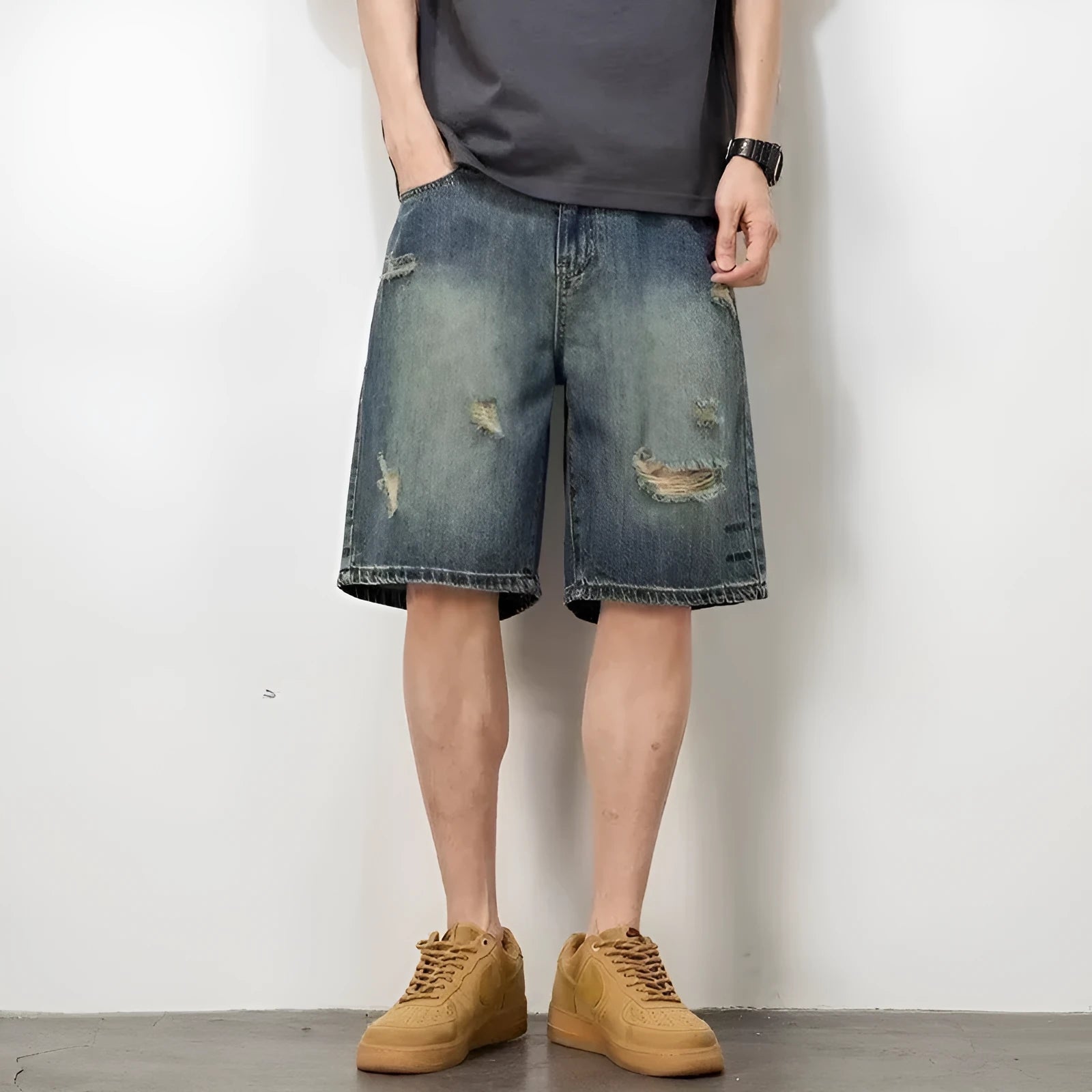 Men's blue denim shorts with loose hole retro styling and straight cut design