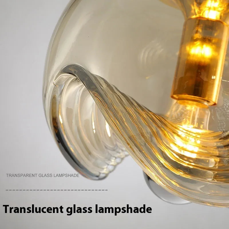 Modern minimalist glass bedside chandelier with 250mm diameter and transparent, amber or smoky grey light colour options