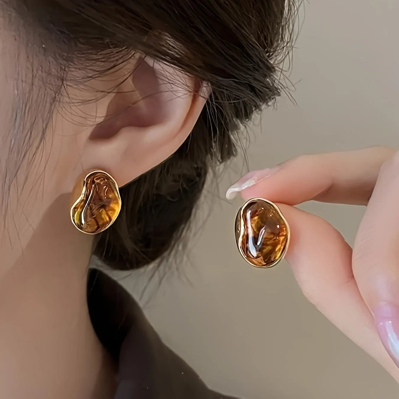 Three pairs of handmade geometric holiday earrings with tassel elements in alloy with electroplating treatment