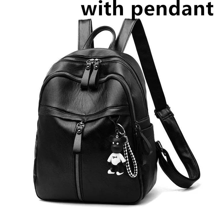 Black PU leather soft surface backpack with double straps showing medium size and organised compartments