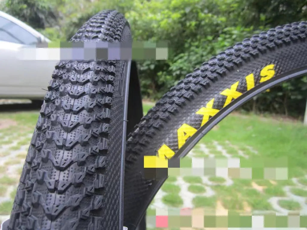 Mountain bike ultralight puncture proof tyre shown in black with white label sidewall option.