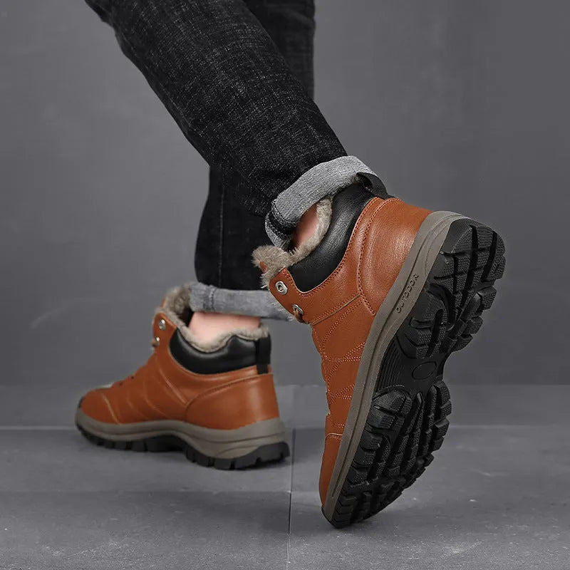 Men's black winter boots with plush lining, lace-up design, thick rubber sole, and round toe