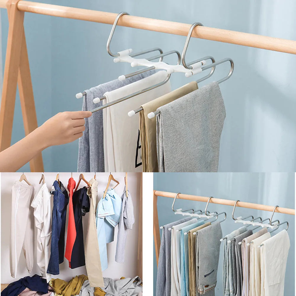 Black 5-in-1 stainless steel trouser hanger with five booms and dual hooks on a clothes rack