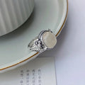 Adjustable opening copper vintage ring with imitation white chalcedony stone and U-shaped design