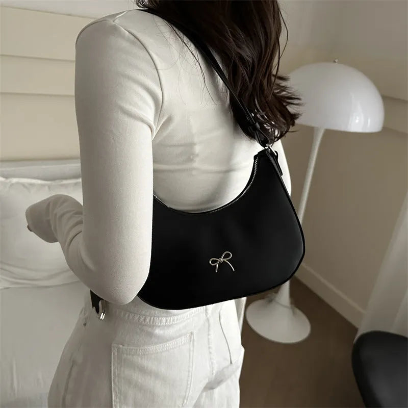 Women's underarm baguette handbag in PU material, dumpling shape, with sewing thread detailing, six colour options