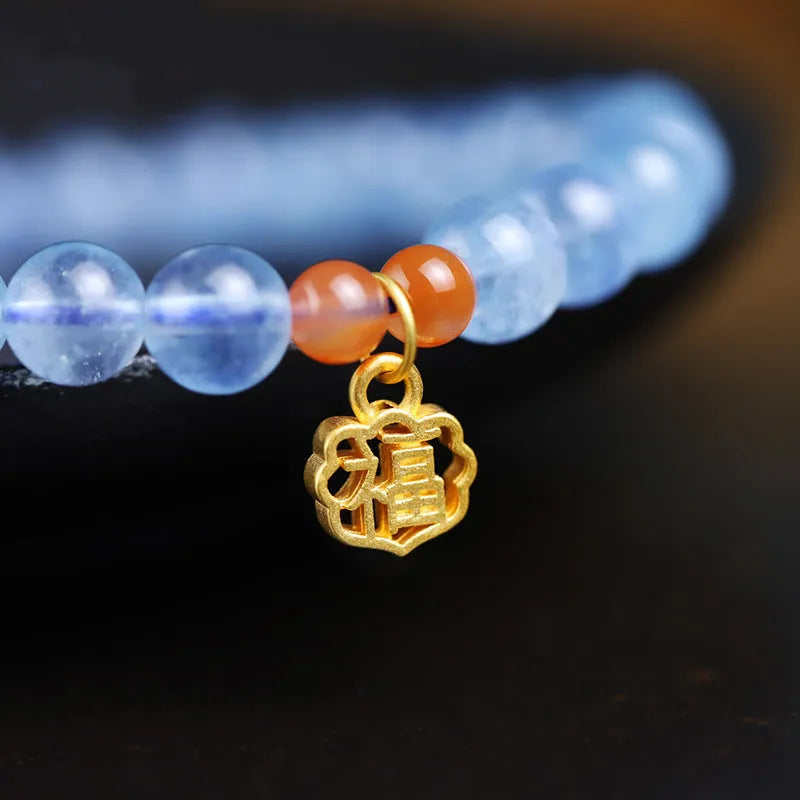 Natural ice translucent 8mm round crystal bead bracelet with sequin accents on display