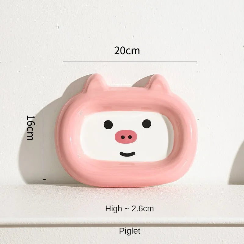 Ceramic animal-shaped cat bowl in a colourful design for pet feeding