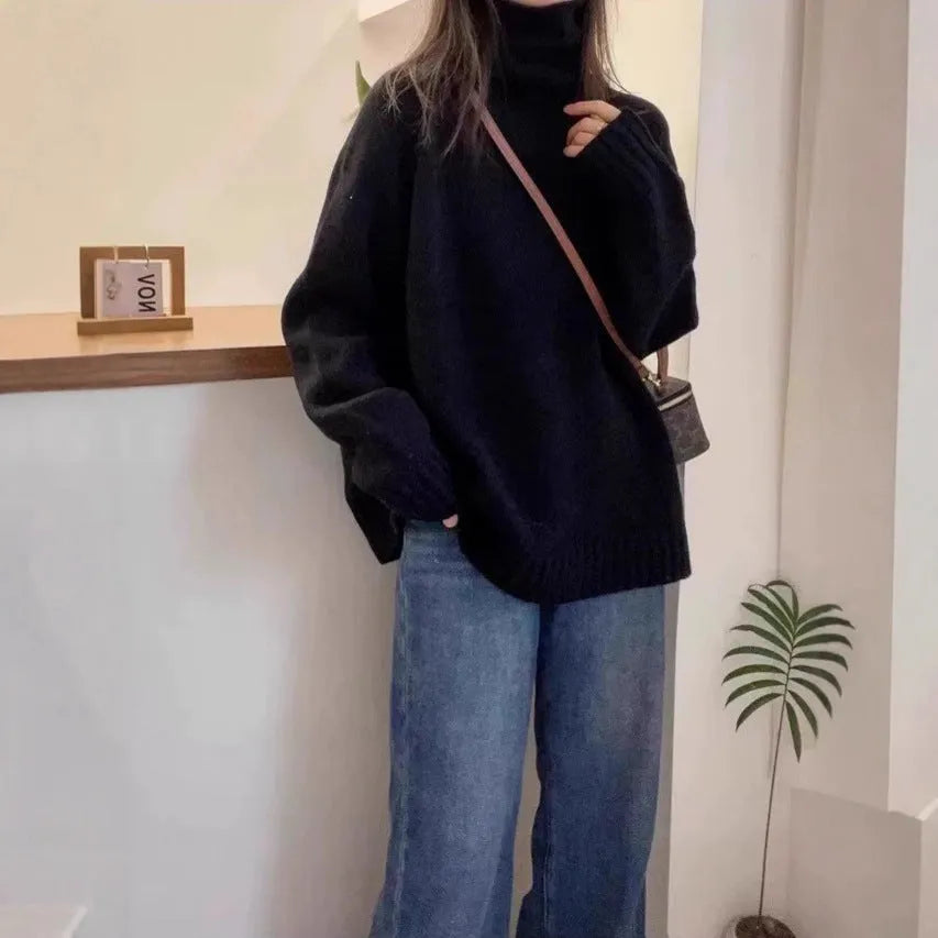 Women's thick loose turtleneck sweater with curling collar and 3D pattern in camel colour.