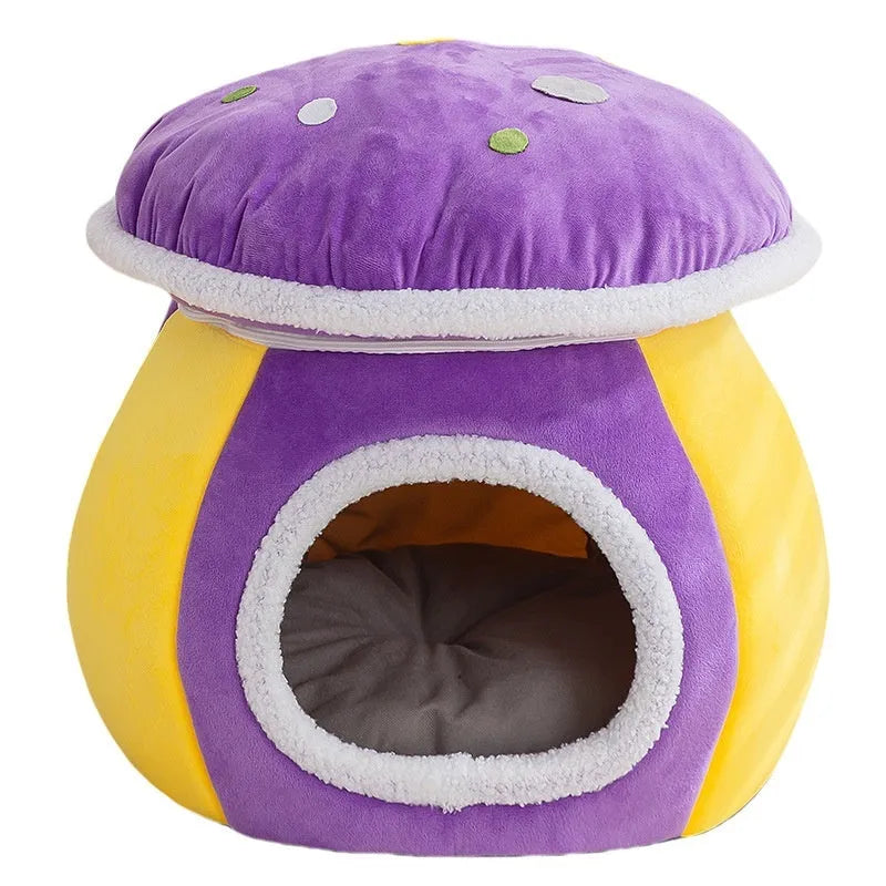 Purple mushroom-shaped cat nest bed with soft plush material and a separate blanket.