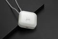 Mini USB portable air purifier necklace in blue colour, showing wearable design and single button.