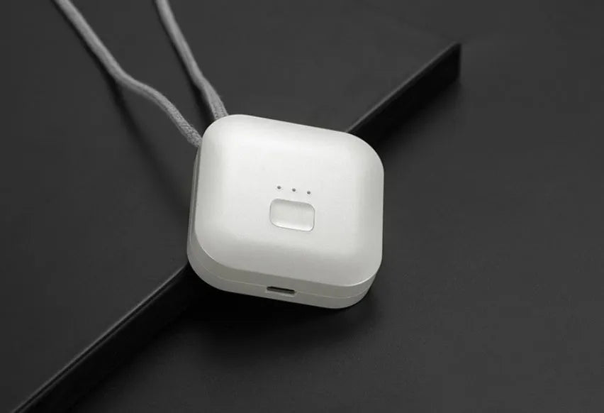 Mini USB portable air purifier necklace in blue colour, showing wearable design and single button.