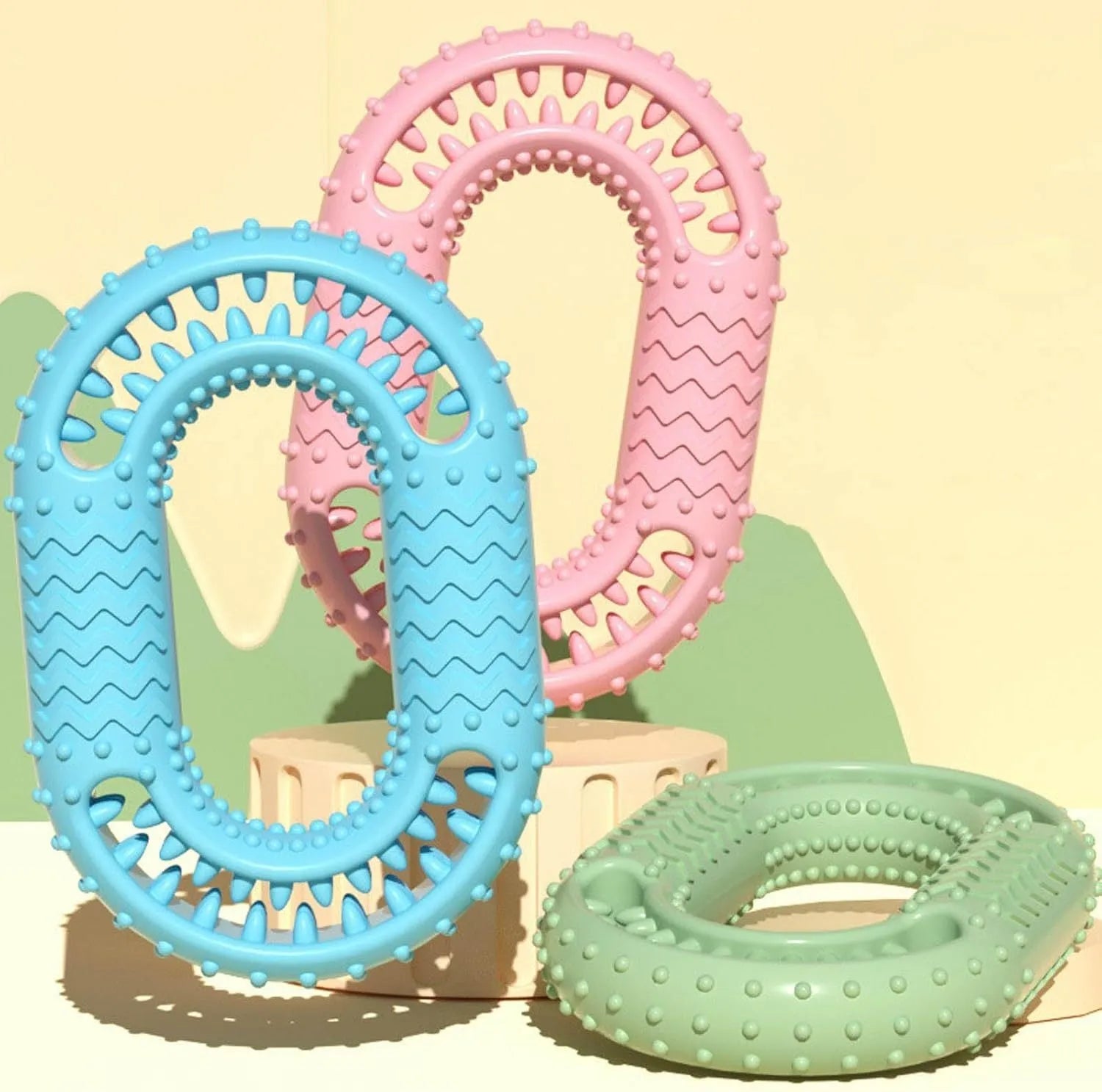 Blue O-ring shaped dog chewing toy for aggressive chewers on white background