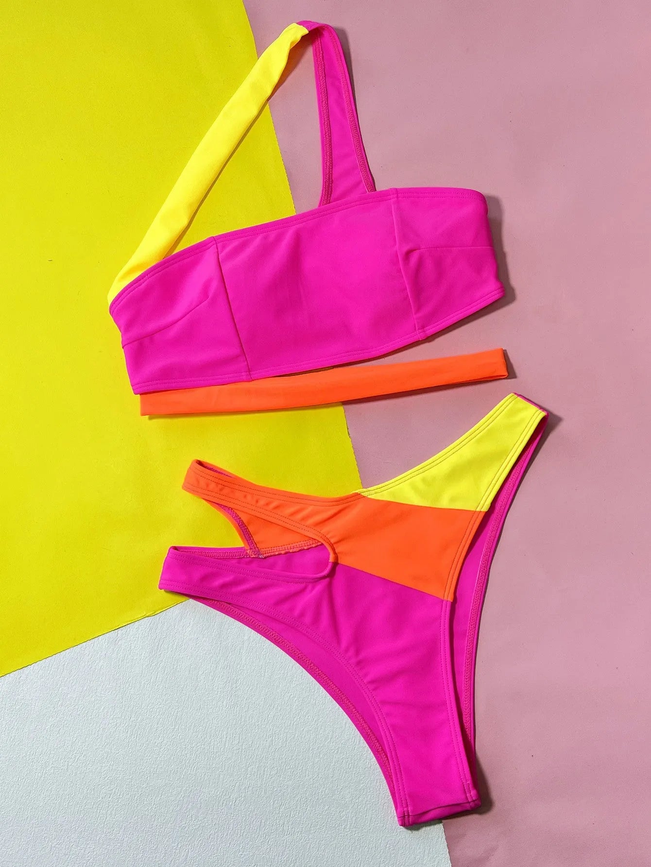 Rose Red hollow contrast split bikini set with nylon and spandex lining for women