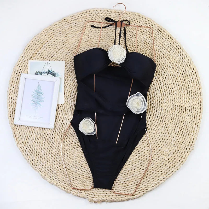 Women's one-piece swimsuit with 3D flower design in black nylon fabric