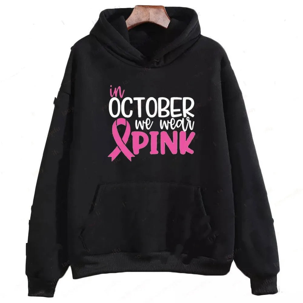 A street fashion pullover hoodie with retro graphic print and side seam pockets, shown in dark blue.