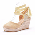 Women's apricot bohemian wedge sandals with beaded tassel strap and buckle closure on a 3cm platform.