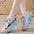 Women's lightweight breathable running shoes in purple, low-top lace-up design