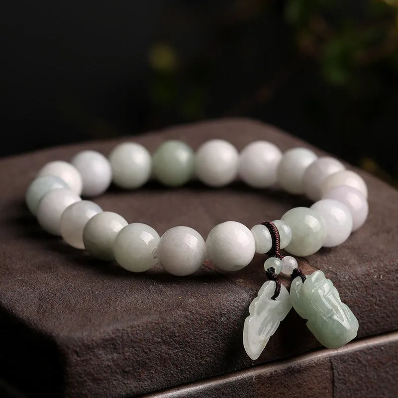 Natural emerald jade bracelet with geometric design and Maitreya Buddha hanging charm