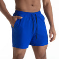 Men's quick-drying mesh stitching casual shorts in black for running and basketball with polyester fabric