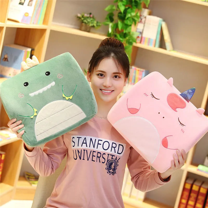 Cartoon character lumbar support pillow with removable memory foam core in pink unicorn design on office chair.