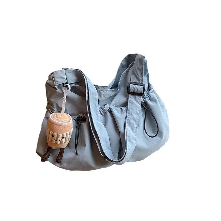 Ultra-light pleated crossbody student bag in polyester cloth with split pocket and mobile phone compartment