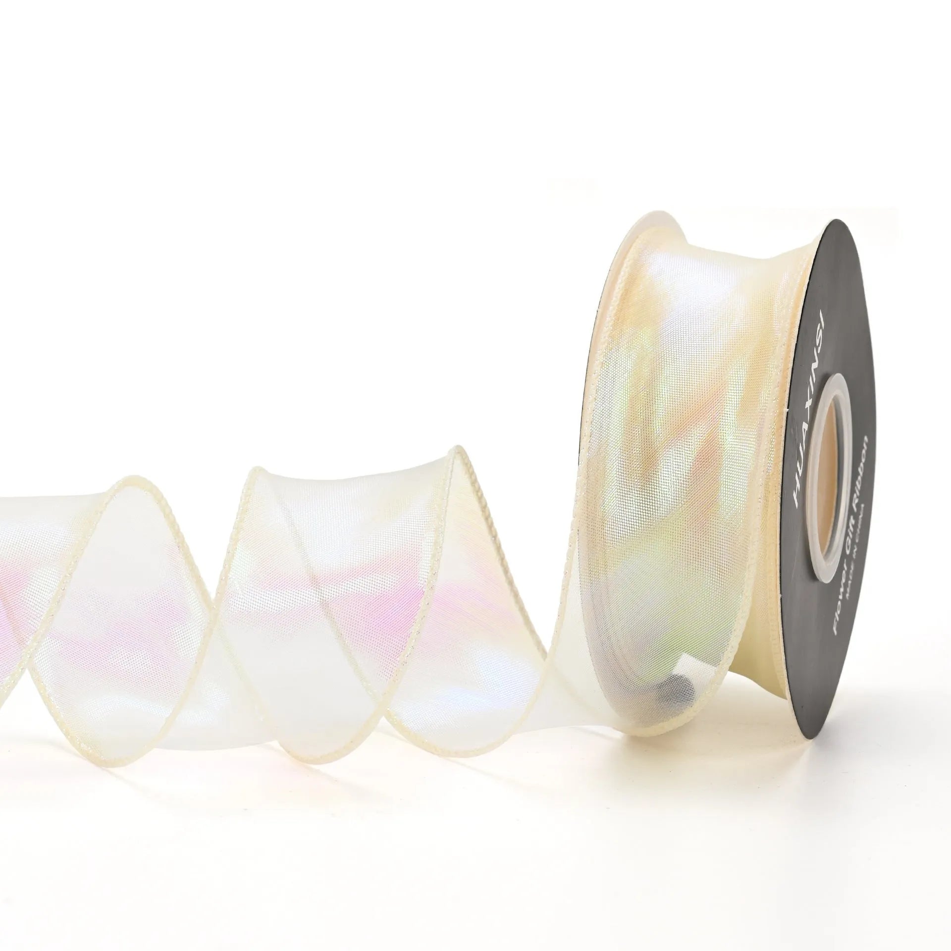 Fishtail yarn mesh ribbon roll in various illusion colours showing wave pattern and 4cm width