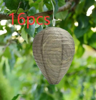 Hexagonal paper beehive lantern with wire frame, shown in photo colour.