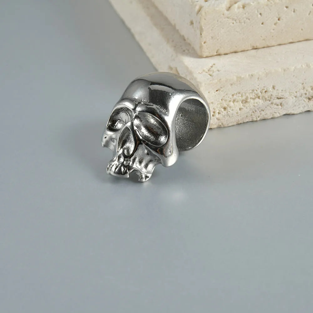 Stainless steel hollow skull Buddha earrings with geometric design in electroplated colours