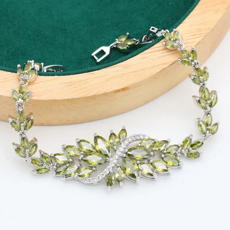 Retro floral jewellery set with necklace, bracelet, earrings, and ring in alloy with copper zircon details.
