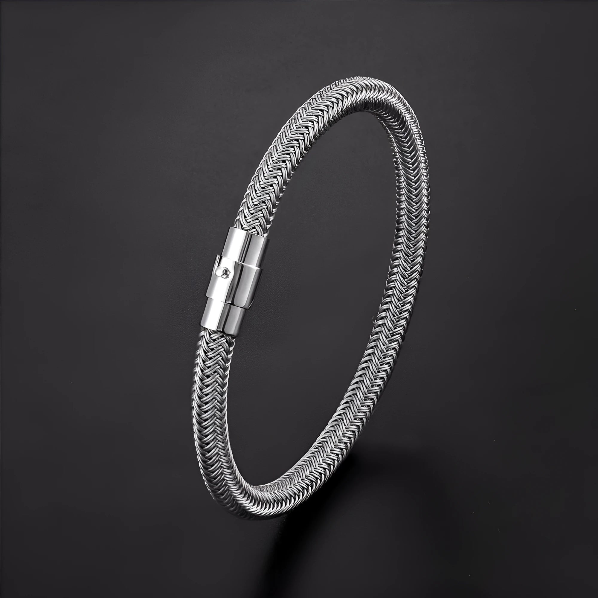 Titanium steel geometric wire bracelet with a magnetic clasp, shown in a silver tone.