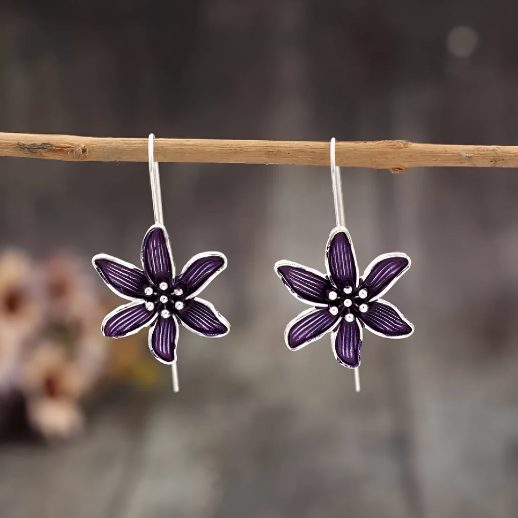 Purple flower-shaped alloy earrings with electroplated finish measuring 3cm in length