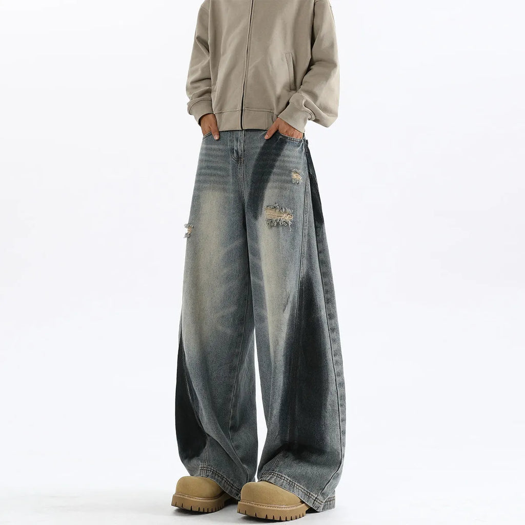 Men's blue American-style splash-ink ripped machete loose fit jeans with cotton fabric and mid waist