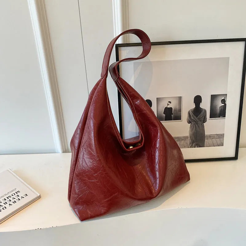 Women's casual soft leather shoulder bag in street trend style with sandwich pocket design