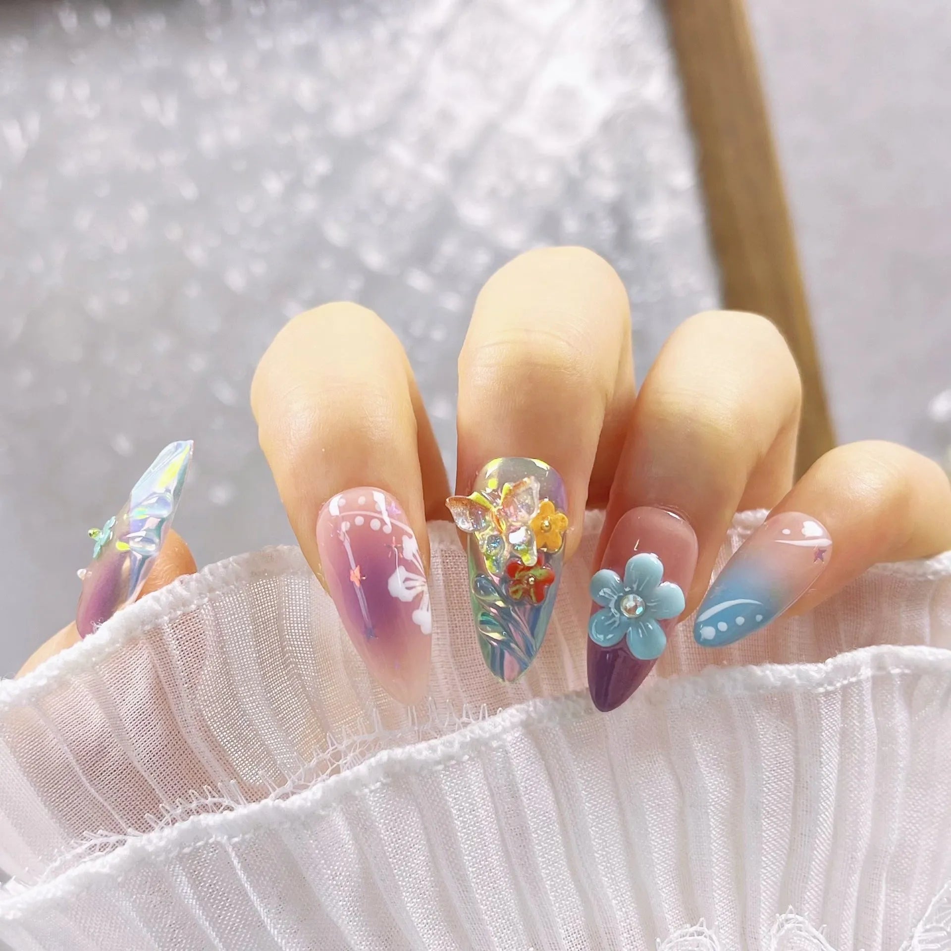 Handmade colourful flower and butterfly nail art sculptures in sizes XS, S, M, L.